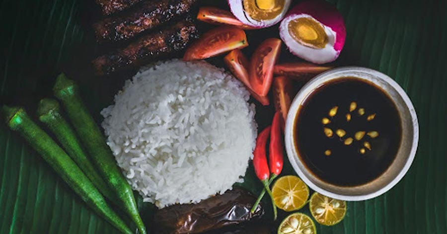 filipino food on a banana leaf