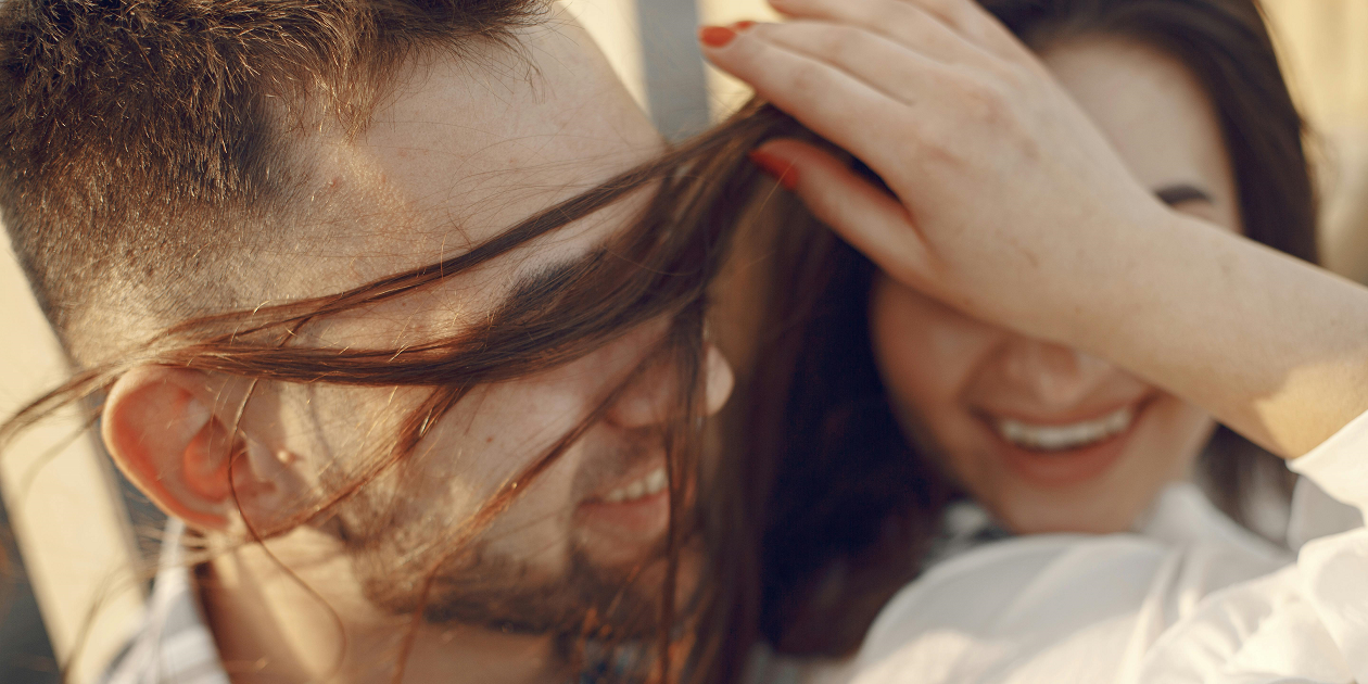 A man and woman flirting.
